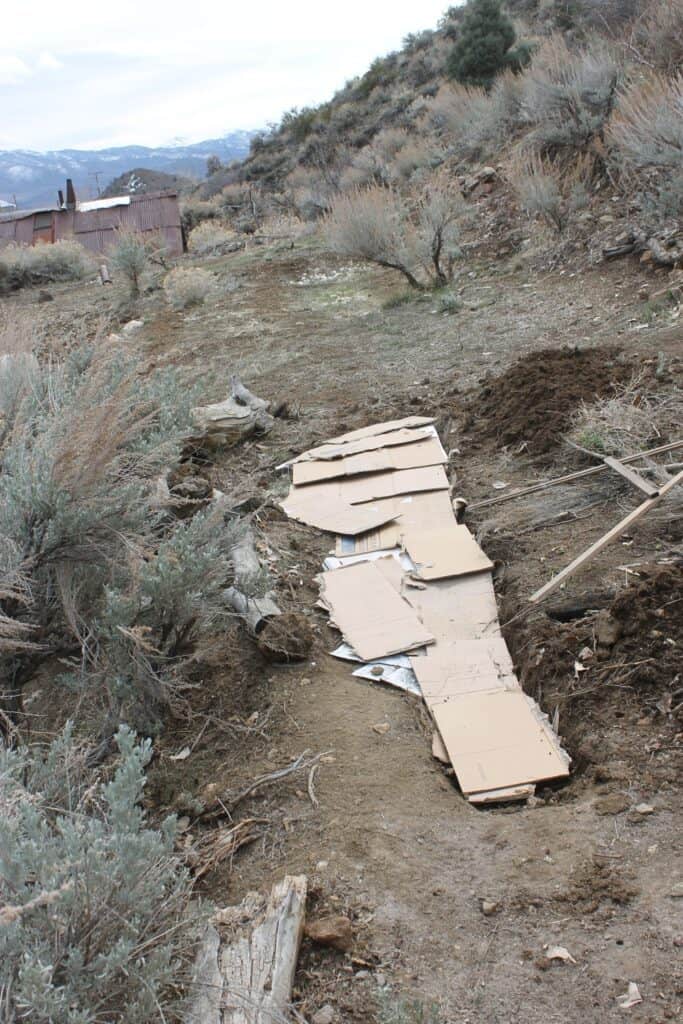 Lignan materials fill the vermi trench to the contour line. 