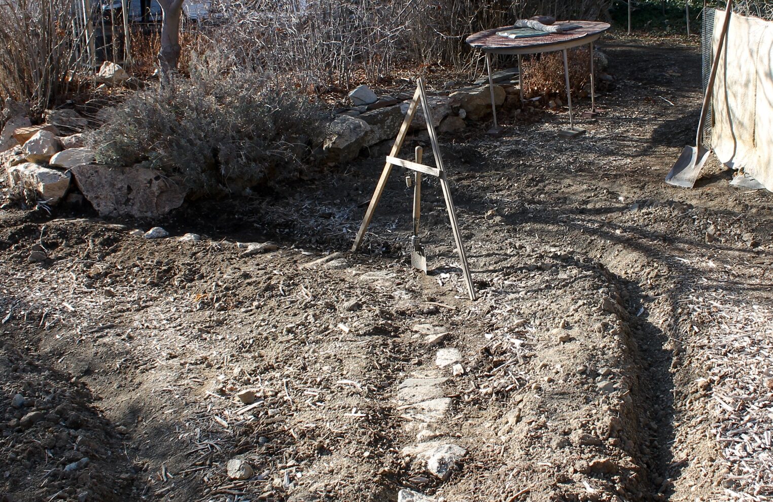 Sheet mulch and contour bunds
